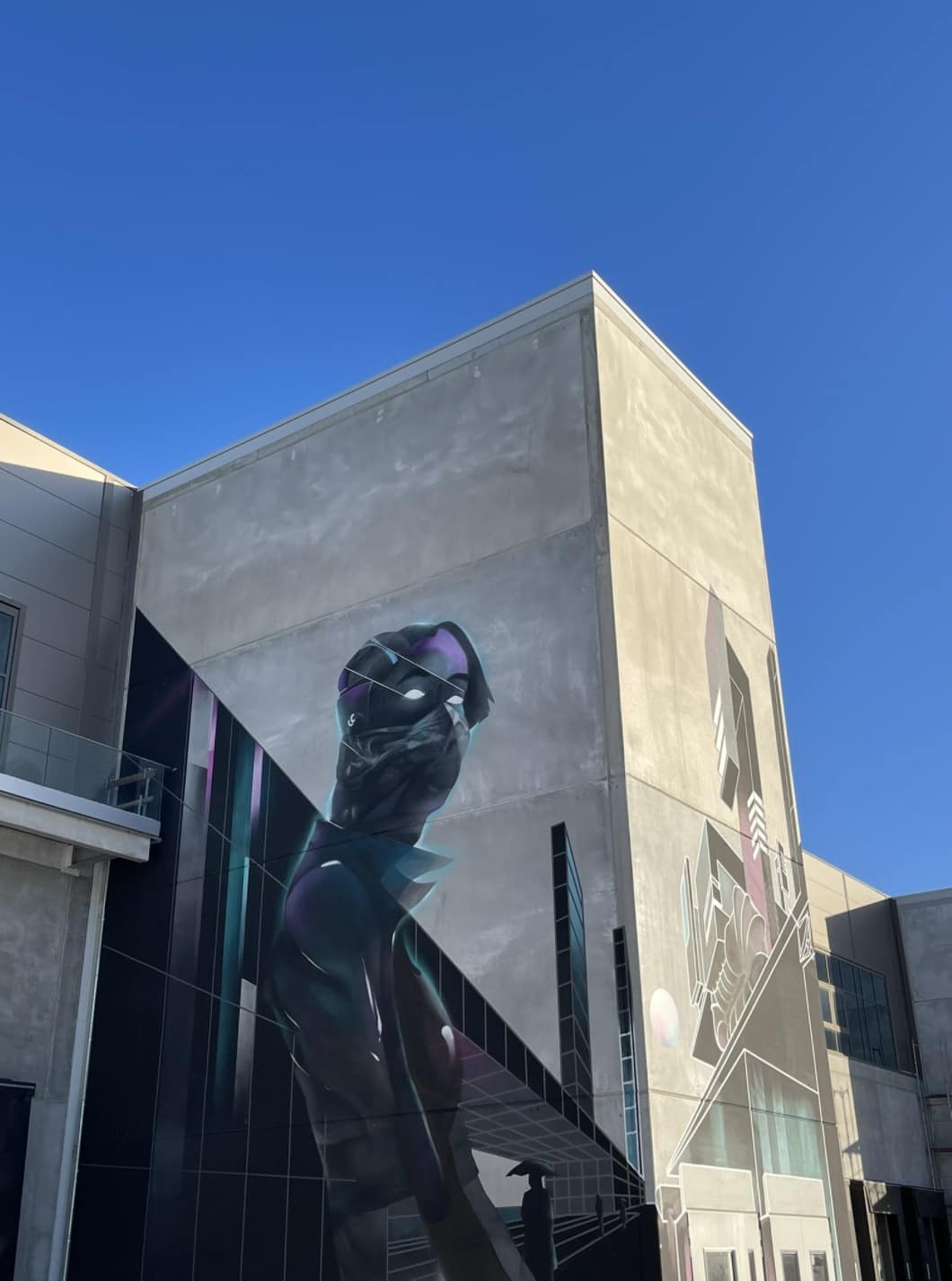 Tesla Marches Ahead with German Mega-Factory Plan - Graffiti Art decorates exterior Giga Berlin
