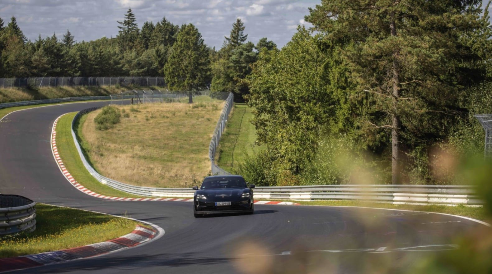 Porsche's Electrifying Feat: Taycan Sets New Nürburgring Record