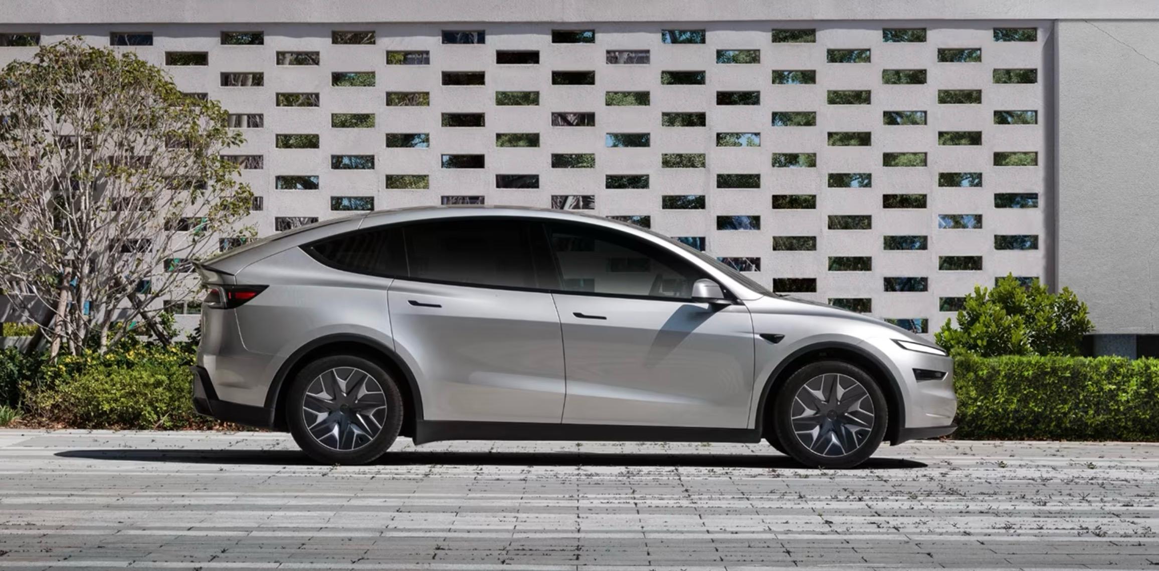 Tesla Model Y parked outside a building