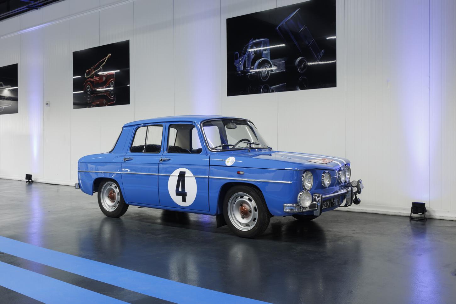 Blue 1965 Renault 8 Gordini four-door sedan with a number 4 racing roundel