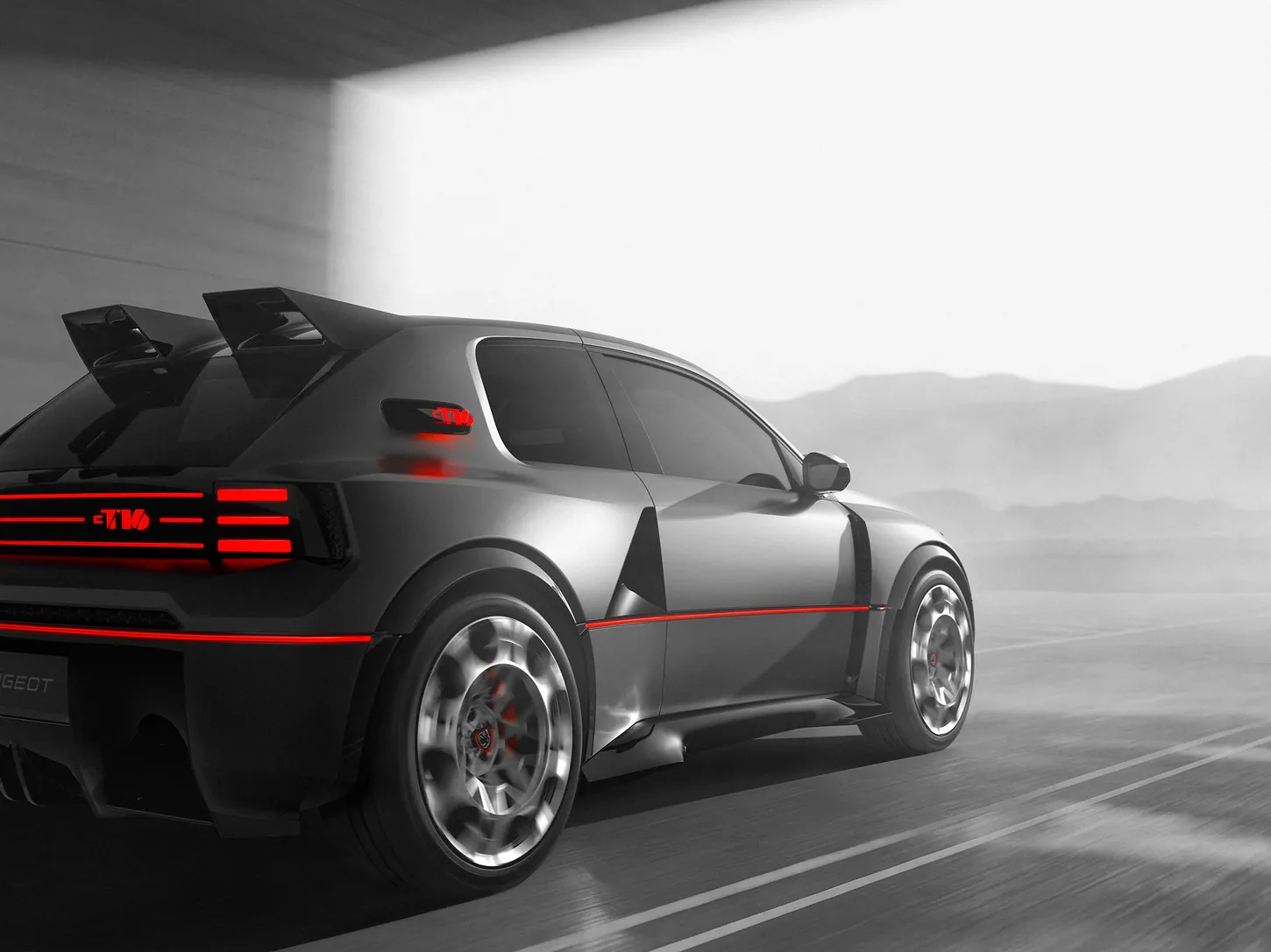 Rear three-quarter view of the grey Peugeot E-T16 Concept showing its two-pointed rear wing, red light bars and red stripe